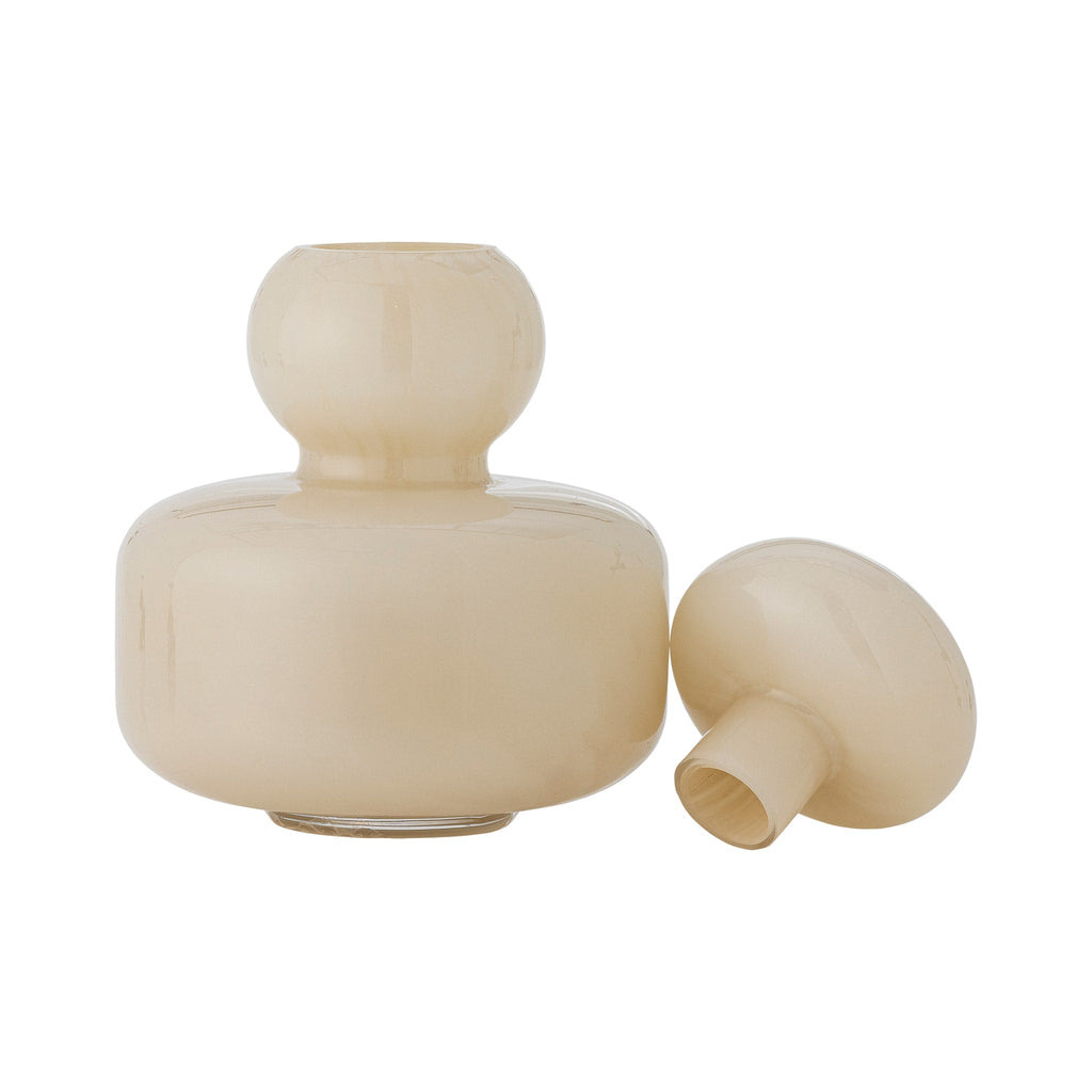 Vase Cynthia beige ouvert sur fond blanc, couvercle amovible posé à côté.